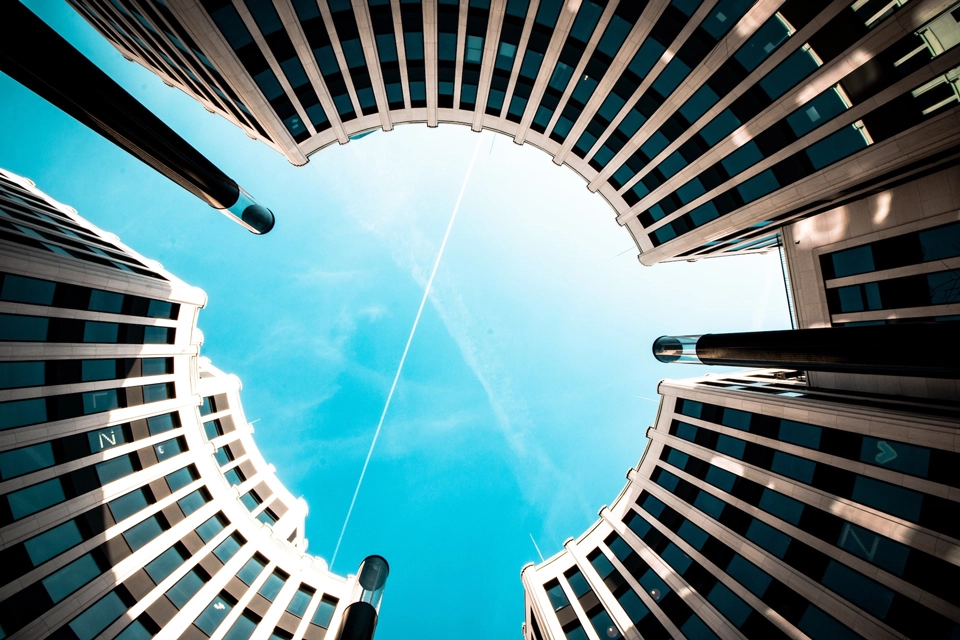 View of the sky between German city skyscrapers.